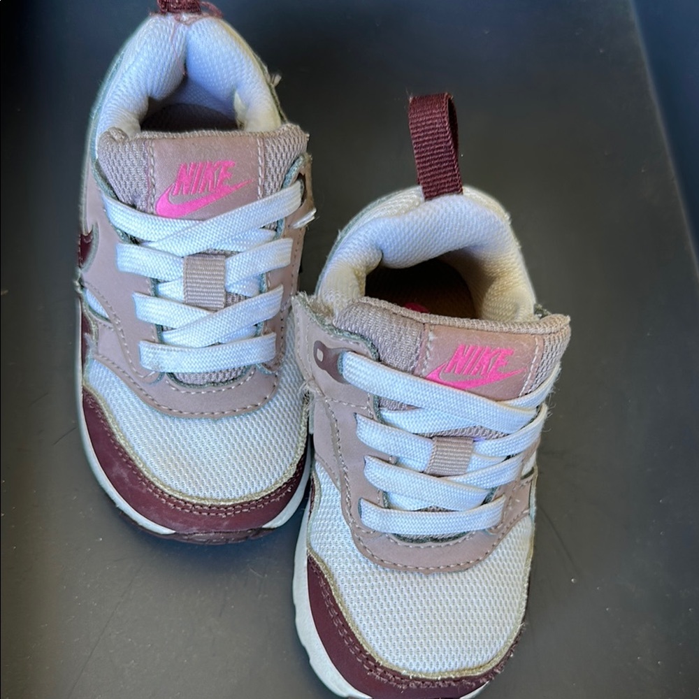 Nike Pink and White Sneakers with Sporty Design